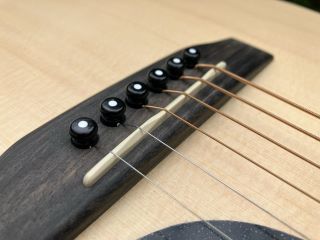 re-stringing an acoustic with bridge pins