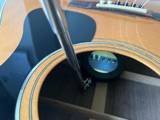 re-stringing an acoustic with bridge pins